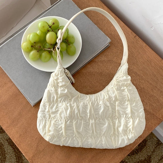 bolso pequeño de hombro, bolso tipo puff color crema, bolso plisado, bolso hobo