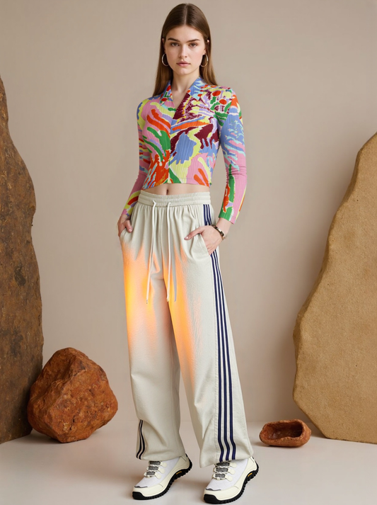 Polo de manga larga con estampado plisado para mujer