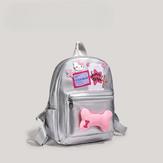 Mochila plateada metálica para niñas, mochila escolar rosa, mochila con diseño de estrella y hueso, elegante y moderna para mujer