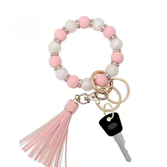 Llavero con borla de PU para bolso de mujer, llavero de silicona con cuentas, pulsera, llavero de coche, bonito soporte para mujeres y niñas.