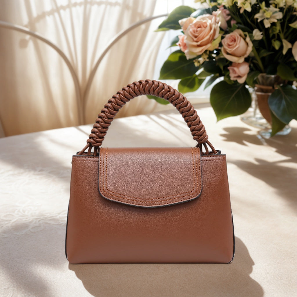 Bolso bandolera pequeño, bolso cuadrado compacto con asa trenzada y diseño único.