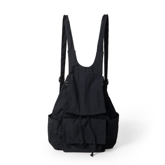 Mochila ligera de nailon para mujer, con múltiples bolsillos y diseño plisado, color beige.