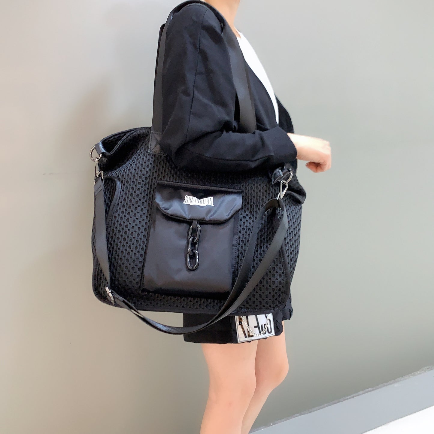 Bolso bandolera grande, sencillo e informal, de tela Oxford.