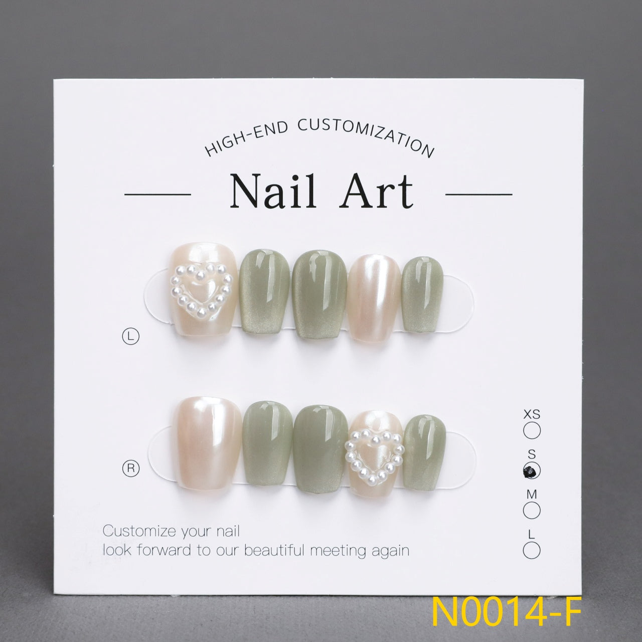 Uñas de ojo de gato verde claro y corazón de perla 