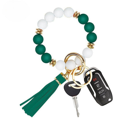 Llavero con borla de PU para bolso de mujer, llavero de silicona con cuentas, pulsera, llavero de coche, bonito soporte para mujeres y niñas. 