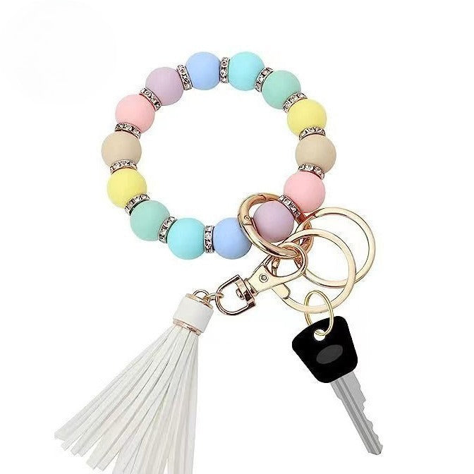 Llavero con borla de PU y cuentas de silicona para bolso, pulsera, llavero de coche, para mujeres y niñas 