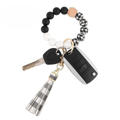Llavero con borla de PU para bolso de mujer, llavero de silicona con cuentas, pulsera, llavero de coche, bonito soporte para mujeres y niñas. 