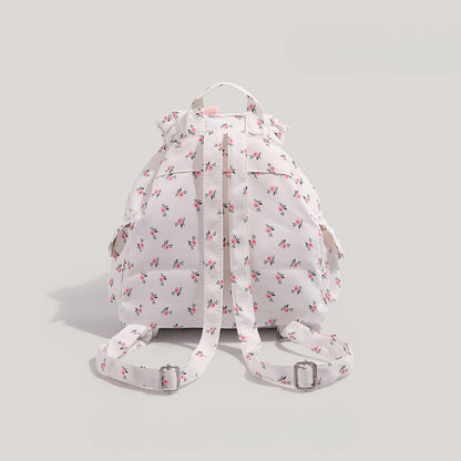 Mochila pequeña y bonita para niñas adolescentes, mochila de lona con estampado floral, mochila bonita para niña, mochila escolar versátil para ir al trabajo o la escuela. 