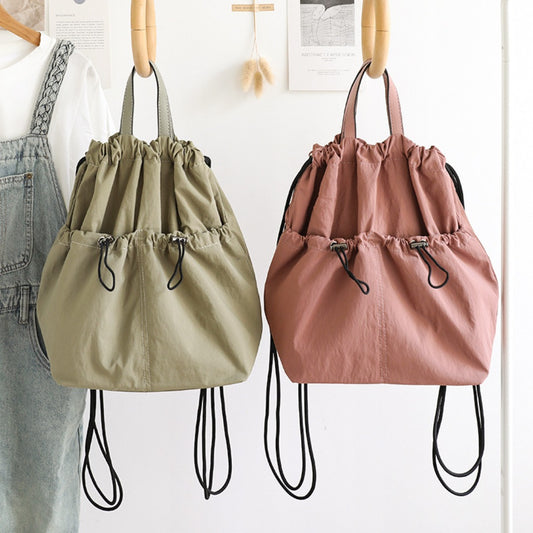 Mochila tipo cubo informal y versátil con cordón ajustable para mujer - Mochila de nailon texturizado, ligera y portátil, compañera de viaje 