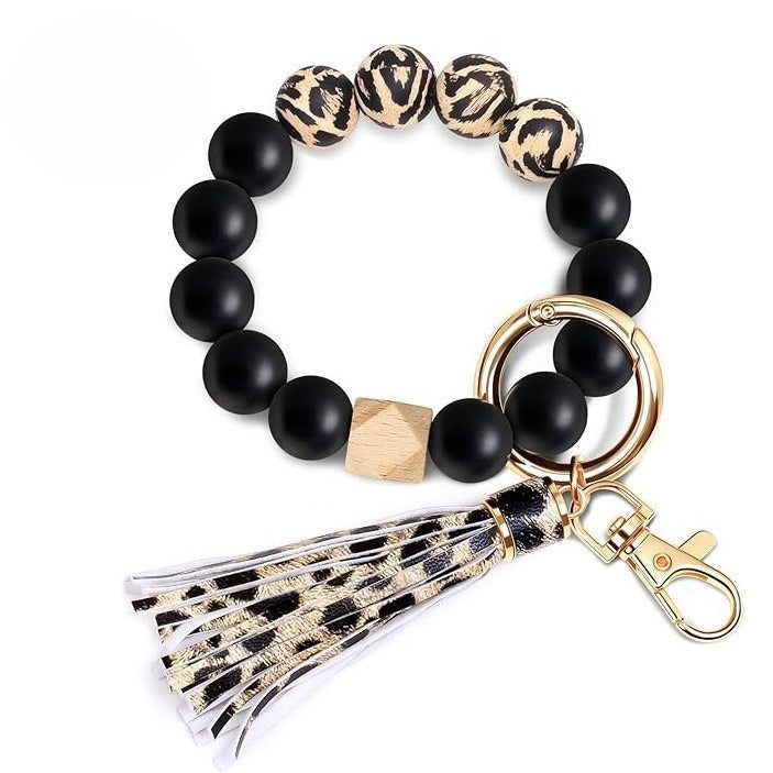 Llavero con borla de PU para bolso de mujer, llavero de silicona con cuentas, pulsera, llavero de coche, bonito soporte para mujeres y niñas. 