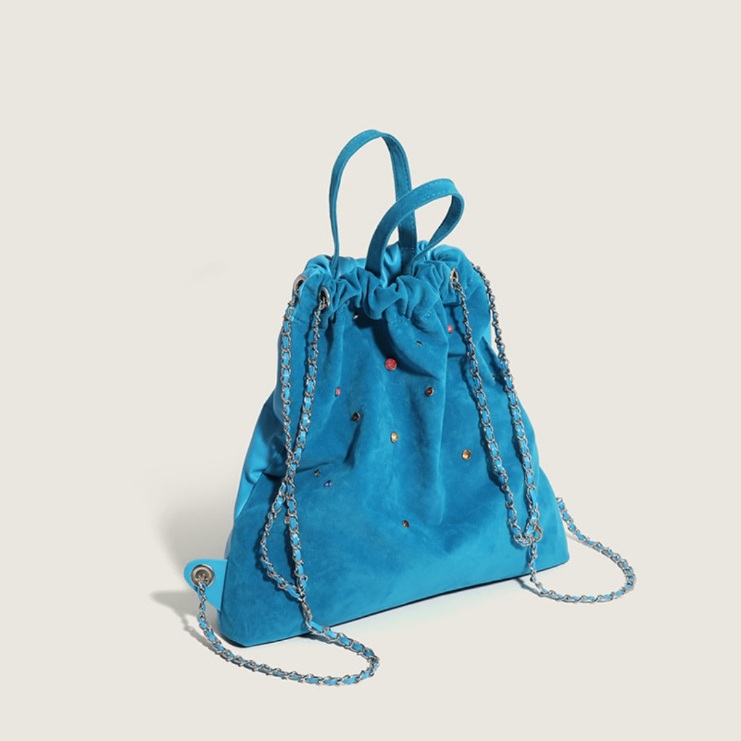 Mochila de mujer de ante mate, con cadena y detalles de piedras preciosas de colores; mochila portátil con cordón ajustable. 