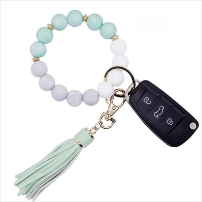 Llavero con borla de PU para bolso de mujer, llavero de silicona con cuentas, pulsera, llavero de coche, bonito soporte para mujeres y niñas. 
