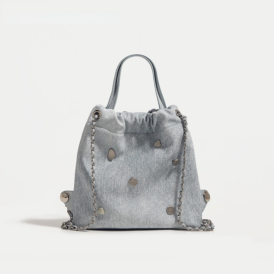 Mochila vaquera azul con cadena para mujer, elegante y sencilla, multifuncional y portátil, con asa superior. 