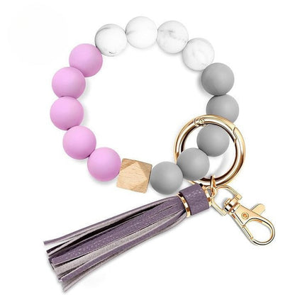 Llavero con borla de PU y cuentas de silicona para bolso, pulsera, llavero de coche, para mujeres y niñas 