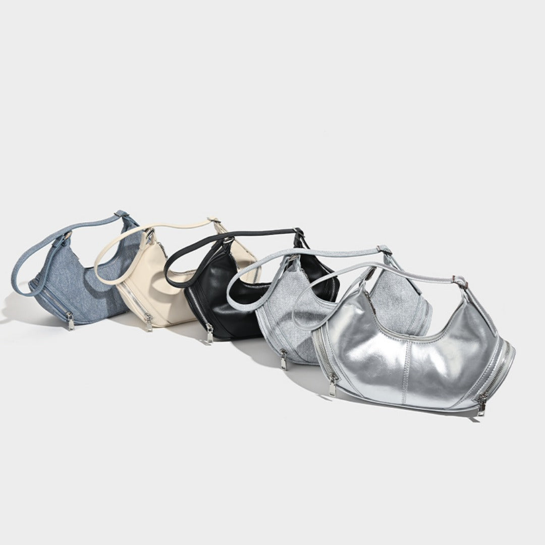 Bolso bandolera estilo hobo, elegante y vintage, con bolsillo con cremallera. También disponible en versión de hombro o bajo el brazo. 