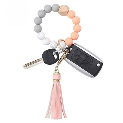 Llavero con borla de PU y cuentas de silicona para bolso, pulsera, llavero de coche, para mujeres y niñas 