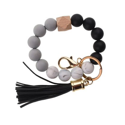 Llavero con borla de PU y cuentas de silicona para bolso, pulsera, llavero de coche, para mujeres y niñas 