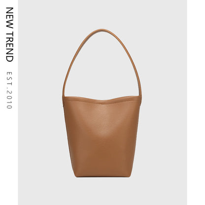 Bolso de mano versátil de diseño, bolso hobo, bolso tipo cubo texturizado para mujer 