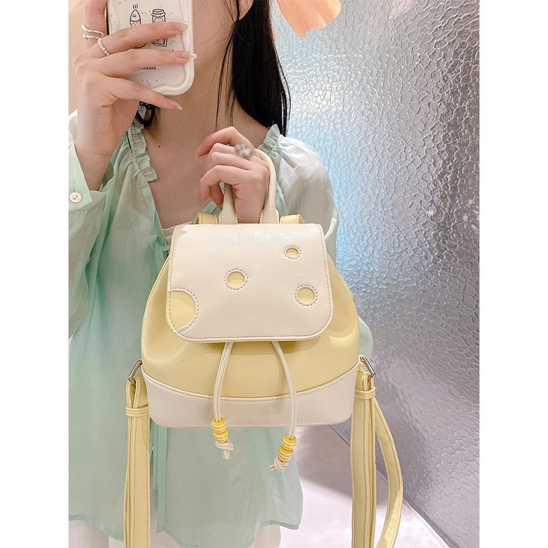 Adorable mochila de queso: una linda mochila pequeña para ir a la escuela con estilo en verano. 
