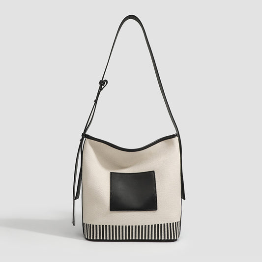Bolso tipo cubo de lona con diseño de empalme, gran capacidad, correa ancha para el hombro, bolso hobo de moda para mujer, bolso de hombro a rayas versátil 