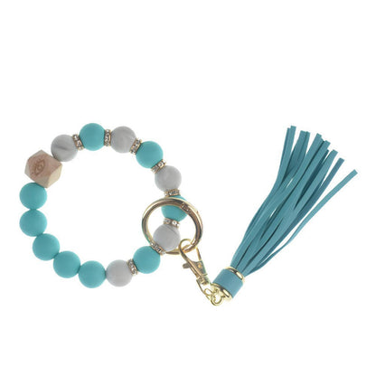 Llavero con borla de PU para bolso de mujer, llavero de silicona con cuentas, pulsera, llavero de coche, bonito soporte para mujeres y niñas. 