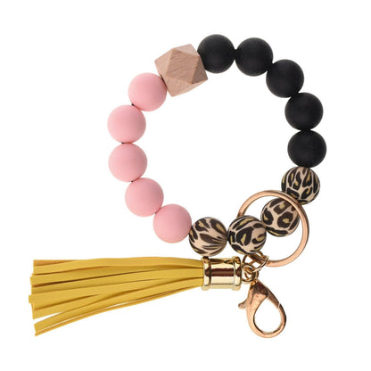 Llavero con borla de PU para bolso de mujer, llavero de silicona con cuentas, pulsera, llavero de coche, bonito soporte para mujeres y niñas. 