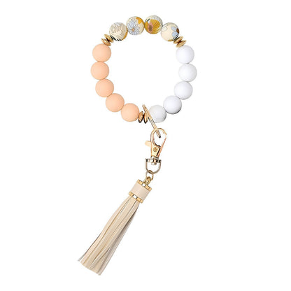 Llavero con borla de PU para bolso de mujer, llavero de silicona con cuentas, pulsera, llavero de coche, bonito soporte para mujeres y niñas. 