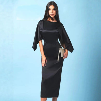 Vestido de noche ajustado con mangas abullonadas