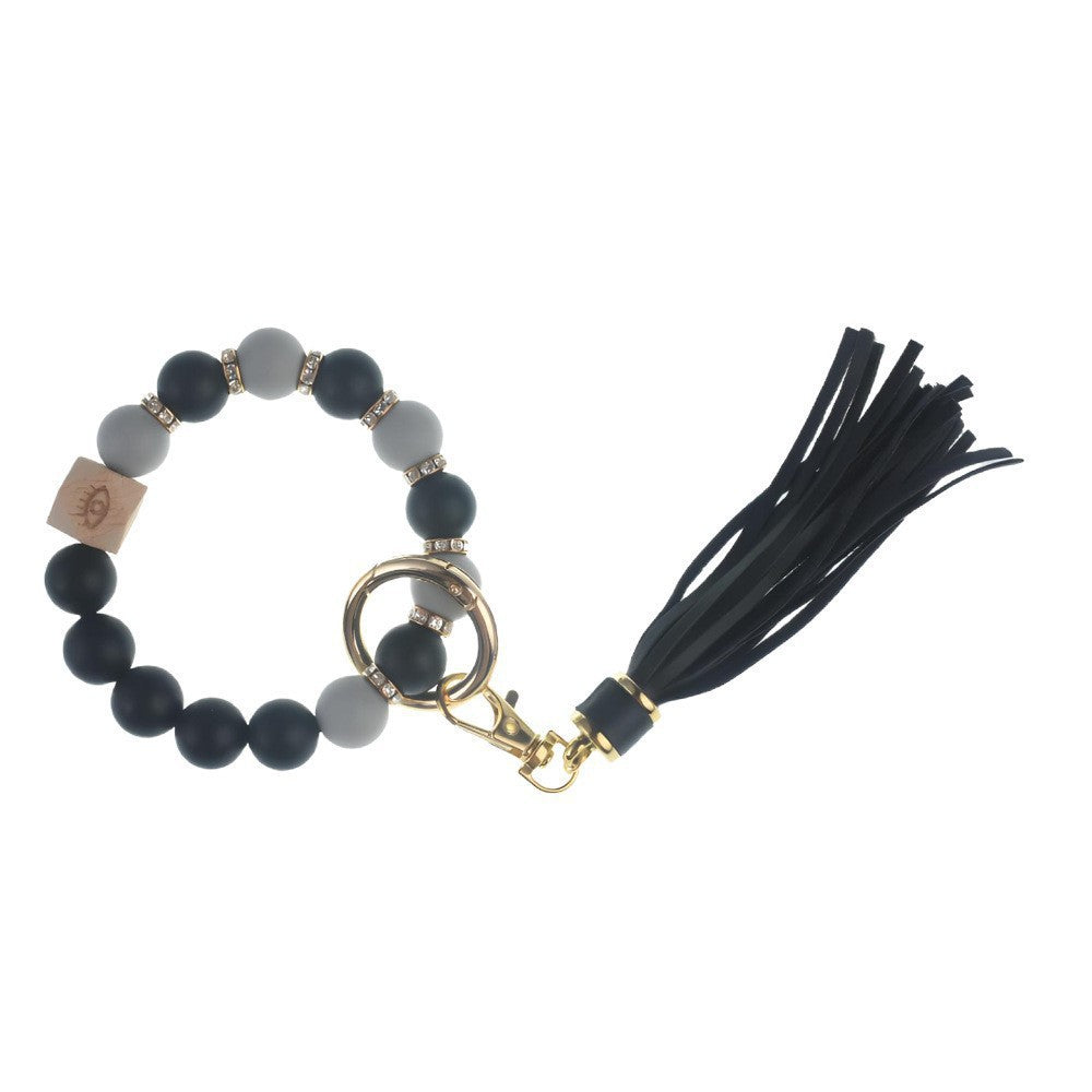 Llavero con borla de PU para bolso de mujer, llavero de silicona con cuentas, pulsera, llavero de coche, bonito soporte para mujeres y niñas. 