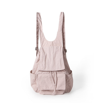 Mochila ligera de nailon para mujer, con múltiples bolsillos y diseño plisado, color beige. 