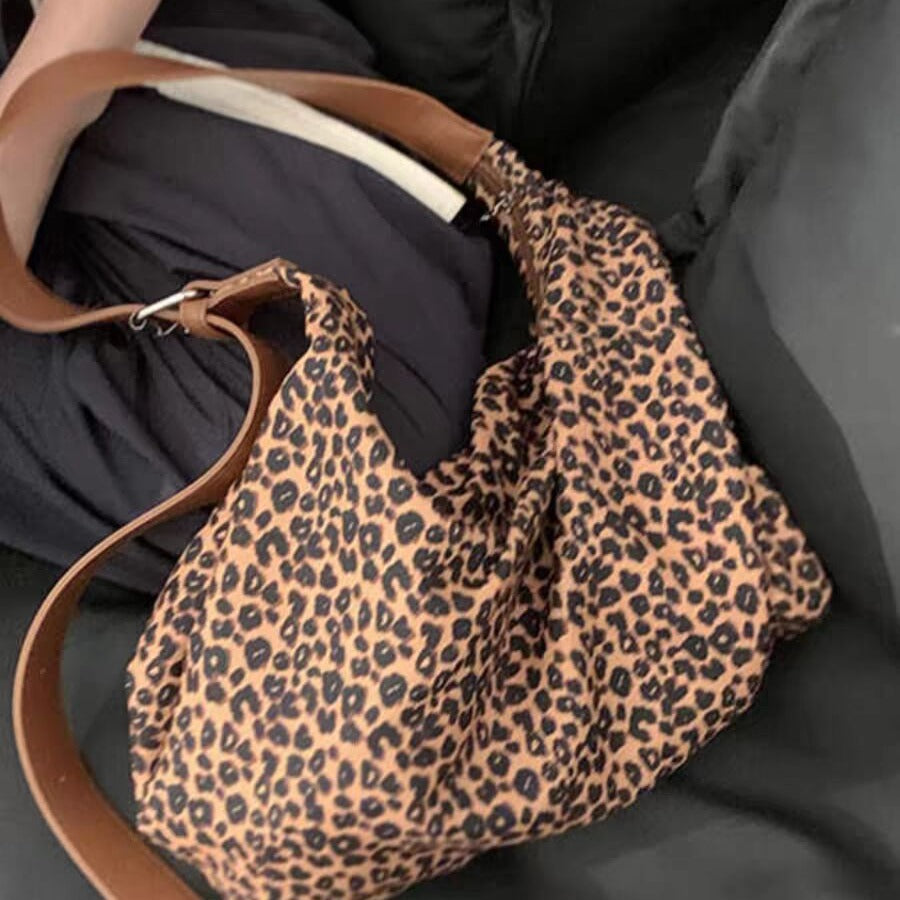 Bolso hobo de gran capacidad con estampado de leopardo, bolso tote para mujer, bolso de hombro versátil y a la moda, bolso de lona para el día a día. 