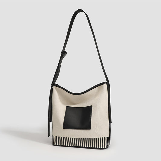 Bolso tipo cubo de lona con diseño de empalme, gran capacidad, correa ancha para el hombro, bolso hobo de moda para mujer, bolso de hombro a rayas versátil 