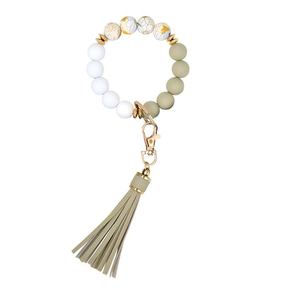 Llavero con borla de PU para bolso de mujer, llavero de silicona con cuentas, pulsera, llavero de coche, bonito soporte para mujeres y niñas. 