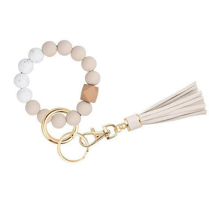 Llavero con borla de PU y cuentas de silicona para bolso, pulsera, llavero de coche, para mujeres y niñas 