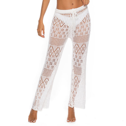 Solid color sexy ladies nightclub sexy see-through cut-out woven anti-hiccup trousers hooked beach pants