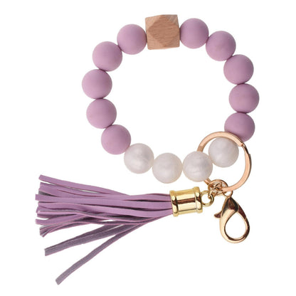 Llavero con borla de PU y cuentas de silicona para bolso, pulsera, llavero de coche, para mujeres y niñas 
