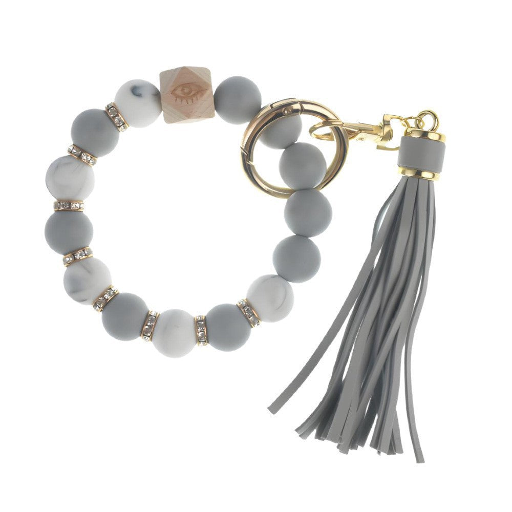 Llavero con borla de PU para bolso de mujer, llavero de silicona con cuentas, pulsera, llavero de coche, bonito soporte para mujeres y niñas. 