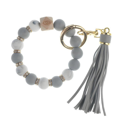 Llavero con borla de PU para bolso de mujer, llavero de silicona con cuentas, pulsera, llavero de coche, bonito soporte para mujeres y niñas. 