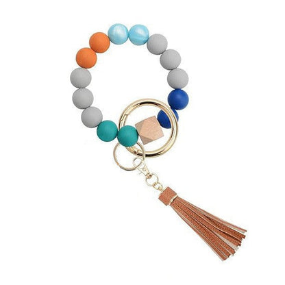 Llavero con borla de PU y cuentas de silicona para bolso, pulsera, llavero de coche, para mujeres y niñas 