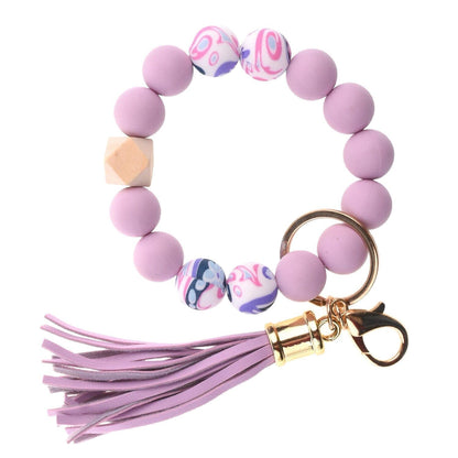 Llavero con borla de PU para bolso de mujer, llavero de silicona con cuentas, pulsera, llavero de coche, bonito soporte para mujeres y niñas. 