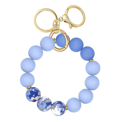 Llavero con borla de PU para bolso de mujer, llavero de silicona con cuentas, pulsera, llavero de coche, bonito soporte para mujeres y niñas. 