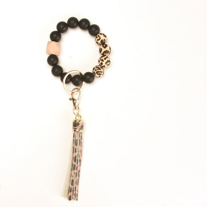 Llavero con borla de PU para bolso de mujer, llavero de silicona con cuentas, pulsera, llavero de coche, bonito soporte para mujeres y niñas. 