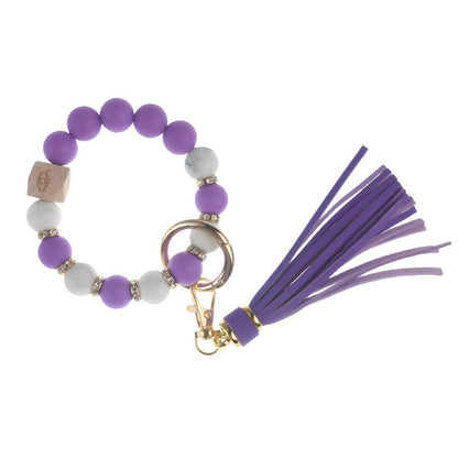 Llavero con borla de PU para bolso de mujer, llavero de silicona con cuentas, pulsera, llavero de coche, bonito soporte para mujeres y niñas. 