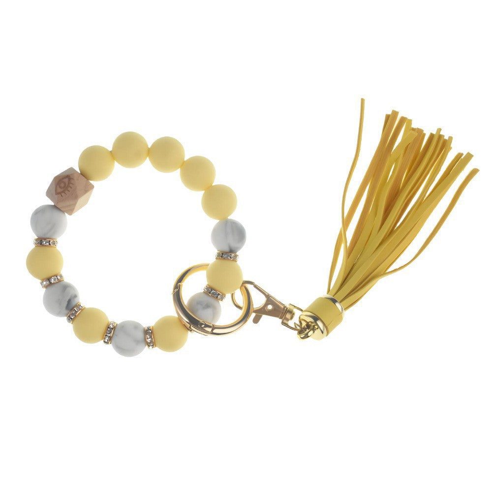 Llavero con borla de PU para bolso de mujer, llavero de silicona con cuentas, pulsera, llavero de coche, bonito soporte para mujeres y niñas. 