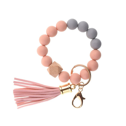 Llavero con borla de PU y cuentas de silicona para bolso, pulsera, llavero de coche, para mujeres y niñas 