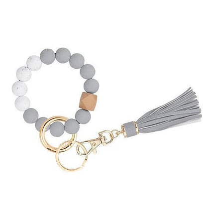 Llavero con borla de PU y cuentas de silicona para bolso, pulsera, llavero de coche, para mujeres y niñas 