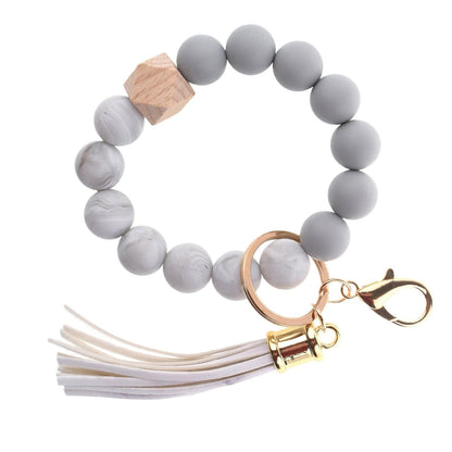Llavero con borla de PU y cuentas de silicona para bolso, pulsera, llavero de coche, para mujeres y niñas 