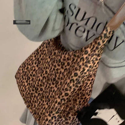 Bolso hobo de gran capacidad con estampado de leopardo, bolso tote para mujer, bolso de hombro versátil y a la moda, bolso de lona para el día a día. 