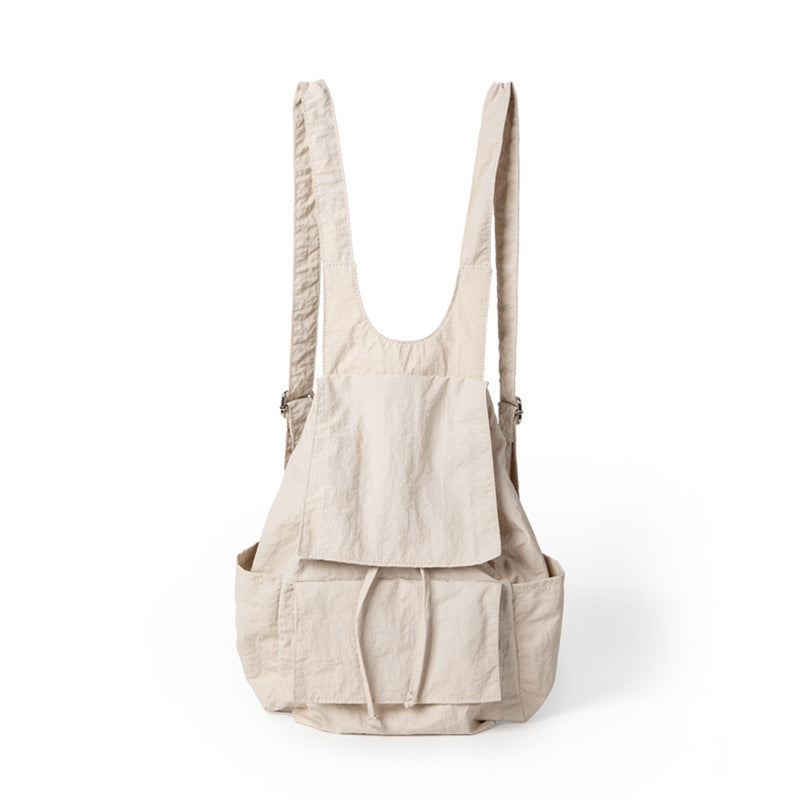 Mochila ligera de nailon para mujer, con múltiples bolsillos y diseño plisado, color beige. 