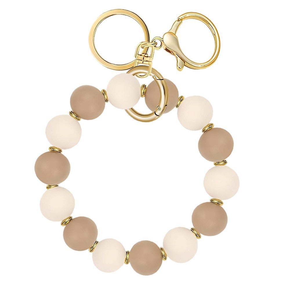 Llavero con borla de PU para bolso de mujer, llavero de silicona con cuentas, pulsera, llavero de coche, bonito soporte para mujeres y niñas. 